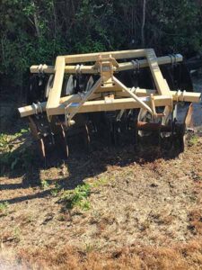 A disc harrow we sold